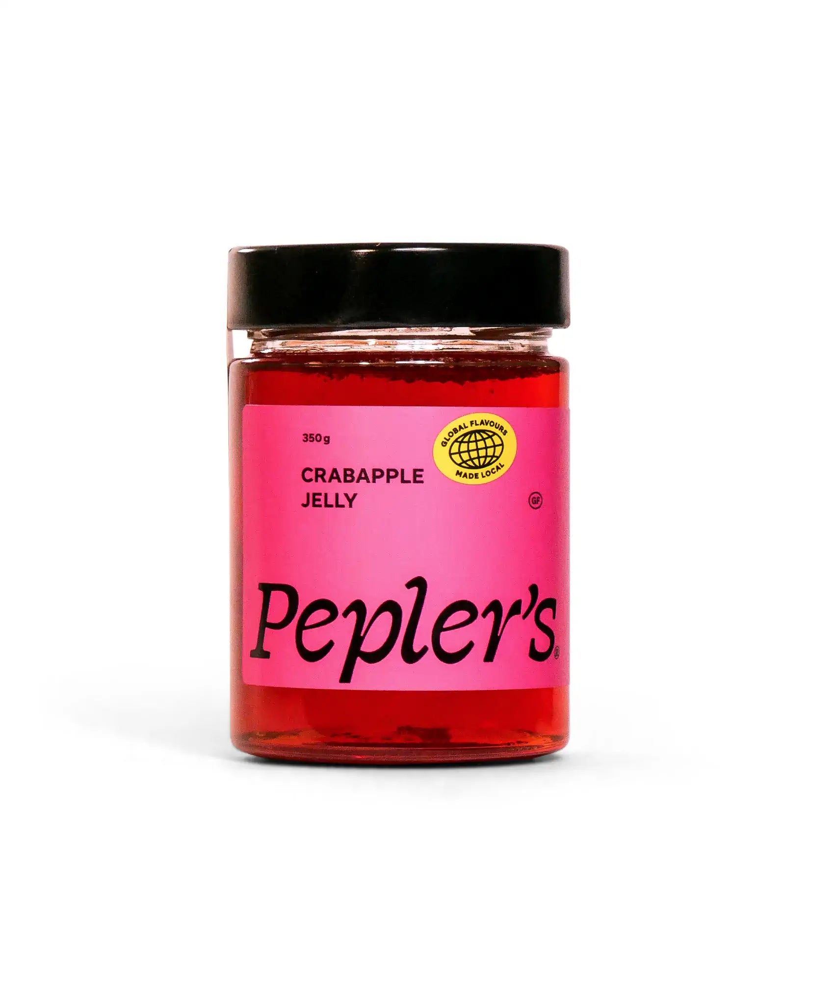 A jar of Pepler's crabapple jelly, prominently featuring a bright pink label with black text. The label indicates a weight of 350 grams and includes a yellow sticker that reads "Global Flavours, Made Local." The jelly has a rich, translucent red colour, set against a plain white background, creating a clean and appealing presentation.