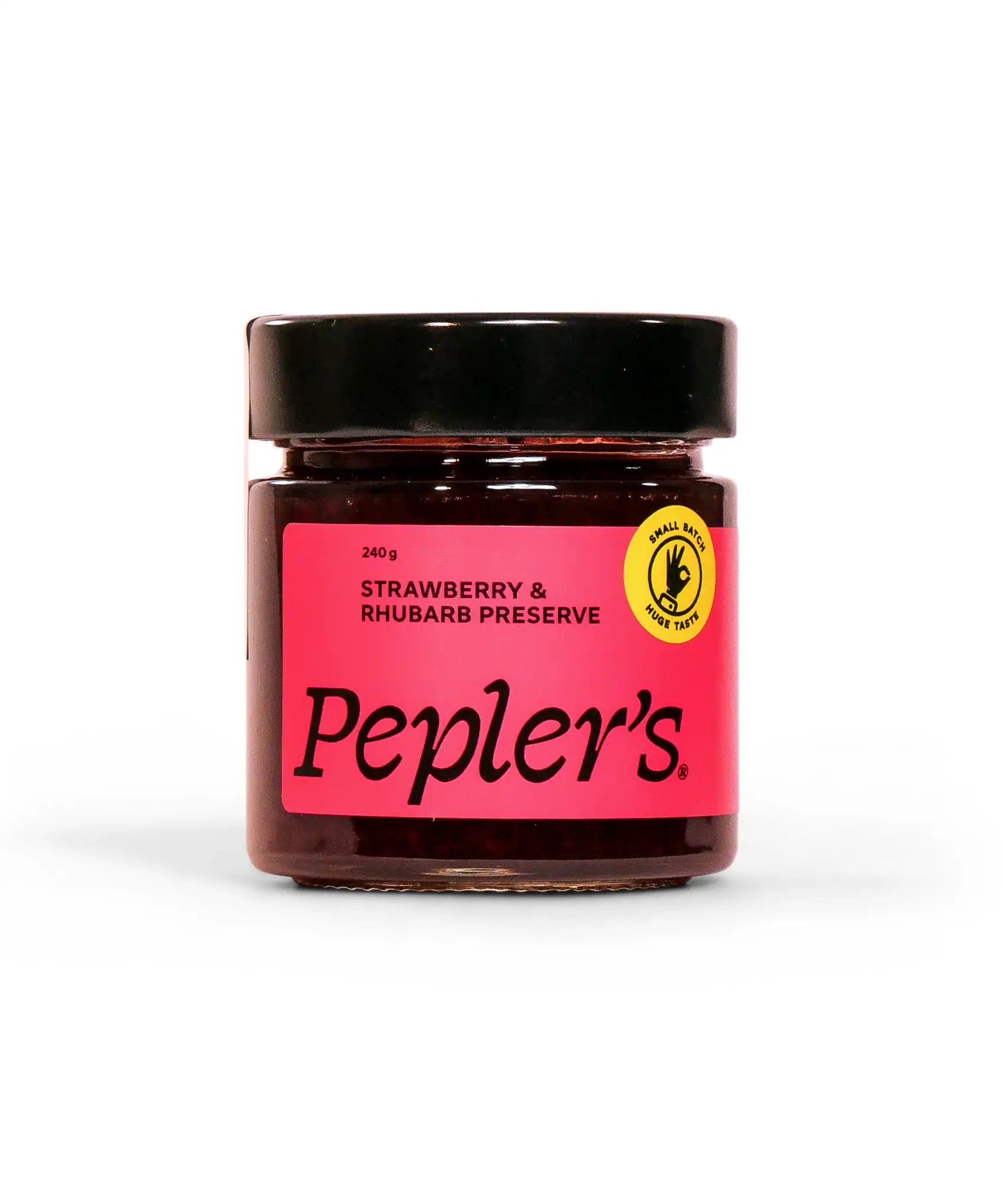 A jar of Pepler's strawberry and rhubarb preserve, featuring a vibrant pink label with bold black text. The label indicates a net weight of 240 grams and includes a yellow seal stating "Small Batch, Huge Taste." The jar sits against a plain white background, highlighting its colourful design.